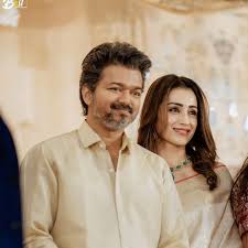 Vijay and Trisha standing together